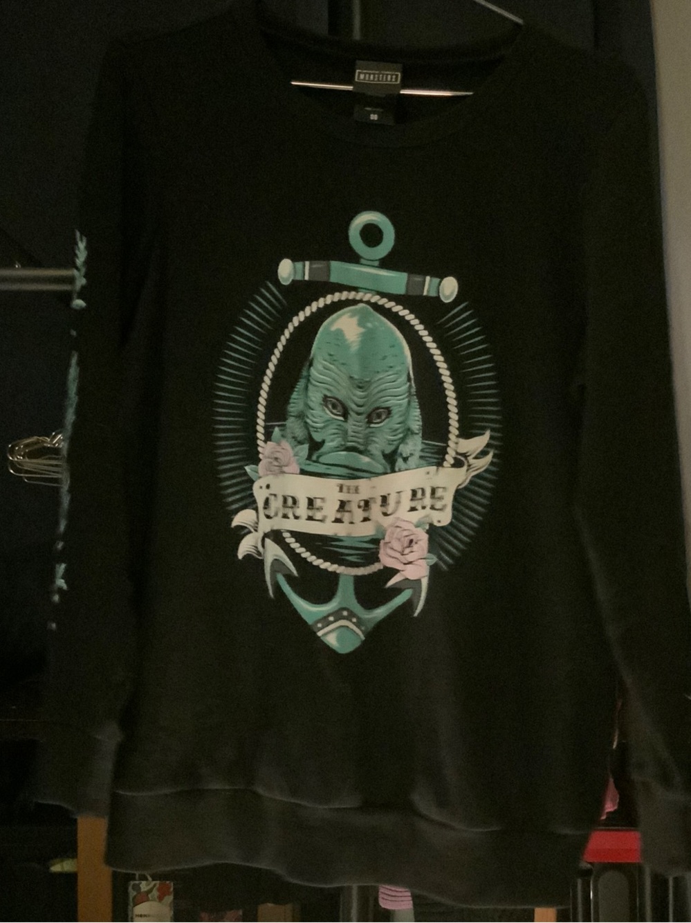 torrid Black Crewneck Sweater with Teal Creature and Pink Floral Graphic
